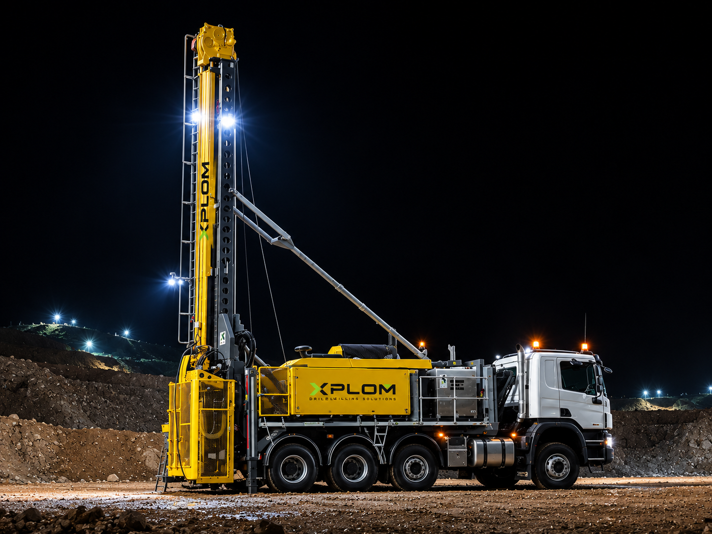 XPLOM diamond core drilling crew recovering core samples on site